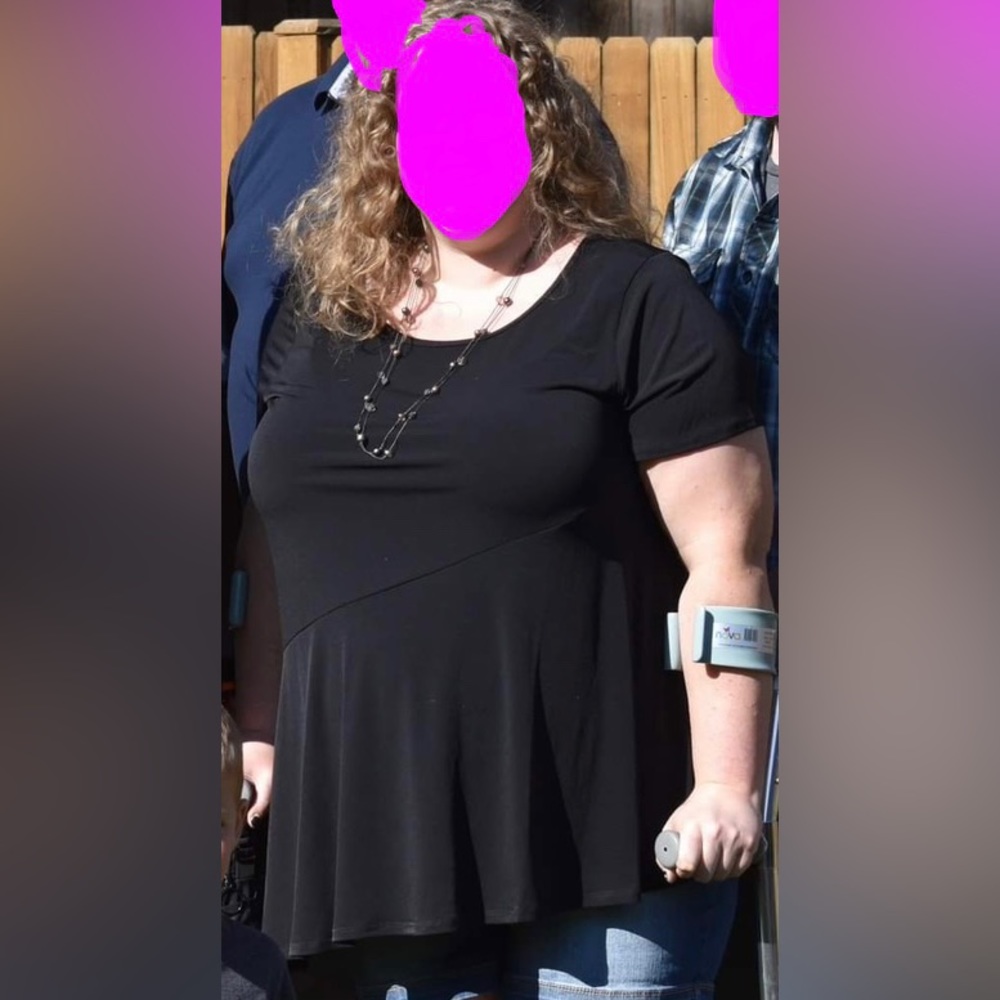 Torrid size 3 black top with asymmetrical hemline!